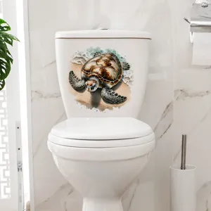 Realistic sea turtle toilet sticker on a white tank in a bright bathroom setting.