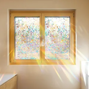 Rainbow refraction effect of a static cling PVC sun catcher window film on a white wall
