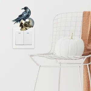 Halloween crow and skull wall sticker applied above a light switch in a cozy room
