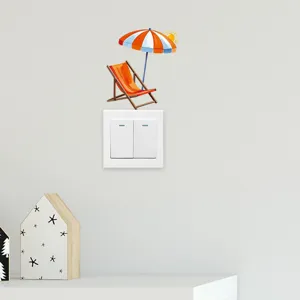 Detail der Sonnenschirm-Wandaufkleber über einem weißen Lichtschalter