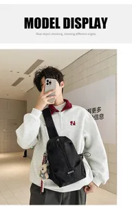 Male model displaying a black outdoor sling bag for hiking and casual urban commuting