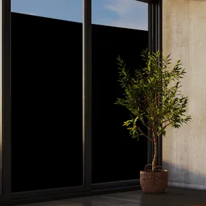 Premium black opaque static cling window film providing total privacy in modern room