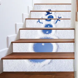 Close-up of 3D Christmas snowman stair stickers applied on wooden steps