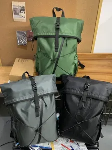 Large capacity roll-top business travel backpacks in green, grey, and black colors.
