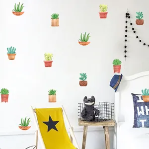 Watercolor succulent potted plant wall decals displayed in a bright modern bedroom décor