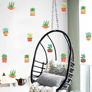 Detailed view of potted succulent wall stickers on a modern living room background.