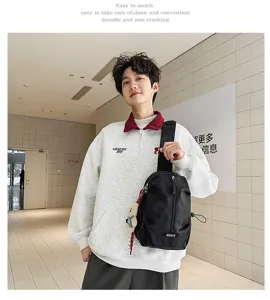 Casual black sling chest bag for outdoor cycling and daily commuting shown on a male model