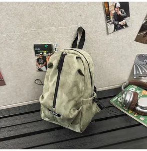 Olive green tie-dye casual chest bag displayed on a stylish black industrial bench