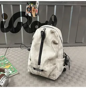 Detail view of marble patterned outdoor cycling chest bag against an industrial background
