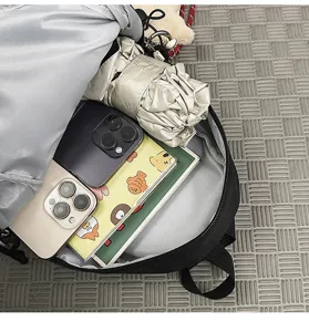 Detailed interior view of a black casual sling bag showing its large storage capacity.