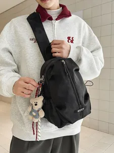 Casual black unisex sling chest bag for outdoor cycling and daily commute with charm