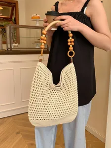 Grand sac cabas en tricot ajouré tissé à la main avec poignées décoratives en bois