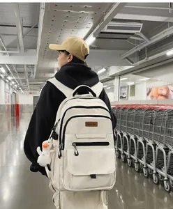 Sac à dos d'étudiant blanc minimaliste grande capacité avec pendentif canard