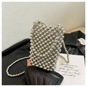 Detailed view of a silver beaded mini crossbody phone bag for women fashion