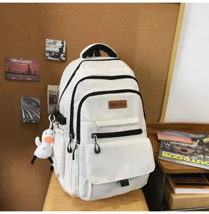 Sac à dos d'étudiant blanc minimaliste de style japonais avec breloque de canard mignon