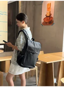 Sac à dos noir imperméable de grande capacité avec rabat pour étudiants en milieu décontracté