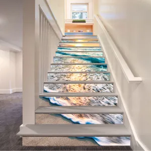 Close-up detail of 3D waterproof beach sunset staircase stickers applied on indoor stairs