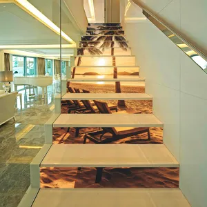 Detail view of 3D sunset beach landscape stickers applied on a modern staircase
