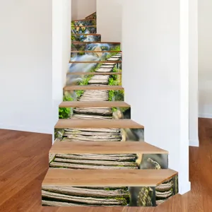 Detail showing 3D waterfall scenery stickers applied to wooden staircase risers.