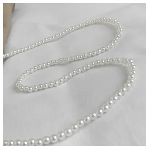 Elegant white pearl beaded chain strap detail for luxury style women's crossbody bags.