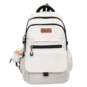 Sac à dos d'étudiant blanc crème minimaliste avec grande capacité et breloque canard