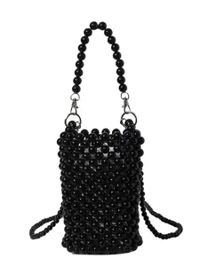 Fashionable handmade black beaded woven mobile phone bag with a pearl shoulder strap