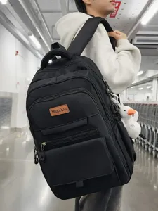 Sac à dos d'écolier noir minimaliste grande capacité avec breloques et design léger