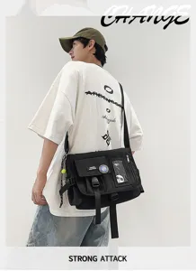 Stylish black nylon messenger bag for students shown on model in cool street outfit