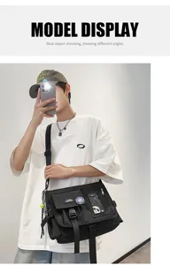 Model displaying a black nylon messenger bag in a minimalist workwear style