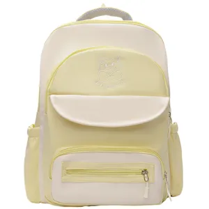 Detailed view of yellow and cream contrast school backpack with cat embroidery