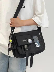 Black nylon messenger bag with trendy badges and transparent card pocket for students