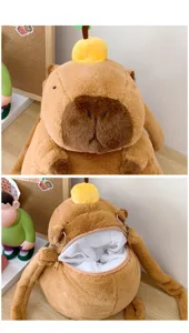 Detailed view of cute plush capybara animal backpack showing zipper opening and white lining