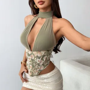 Halter deep V floral corset top detail, showing unique boning shaping and contrast mesh design.