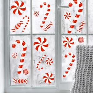 Detailansicht der festlichen rot-weißen Weihnachts-Süßigkeiten Fensteraufkleber auf Glas