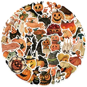 Macro view of assorted vintage Halloween stickers featuring pumpkins and ghosts.