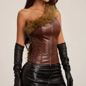 Close-up detail of women faux leather corset top featuring one-shoulder plush fur trim and zip front.