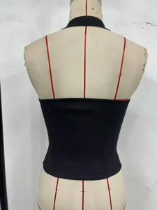 Back detail of a black halter corset top, featuring delicate straps and slim fit design.