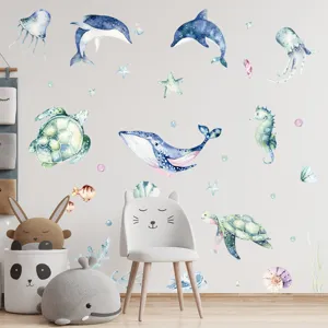 Watercolor ocean animal wall stickers for kids room featuring whales and turtles