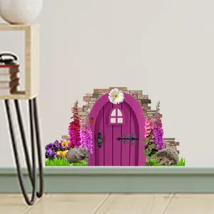 Detail view of a pink fairy door wall decal with cute garden animals and flowers