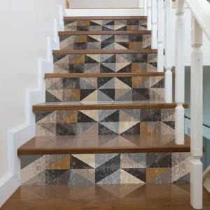 Detailed view of 3D geometric pattern self-adhesive stickers applied on home stairs.