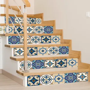 Detailed view of geometric European 3D self-adhesive stickers applied to wooden staircase risers