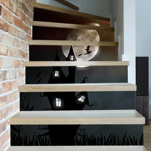 Halloween stair stickers with haunted castle and witch flying across full moon.
