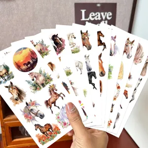 Detailed fanned-out view of multiple sheets featuring colorful watercolor horse temporary tattoos