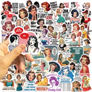 Close-up of vintage retro cartoon female quote stickers for laptop and guitar