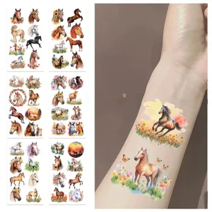 Vibrant watercolor horse temporary tattoos applied on forearm for realistic party demo