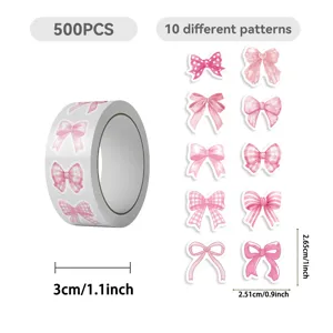Detail view of 500pcs pink bow stickers showing 10 patterns and roll dimensions.