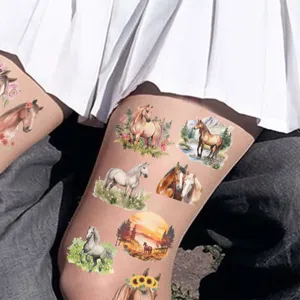 Close-up of waterproof temporary horse tattoo stickers for kids applied on leg