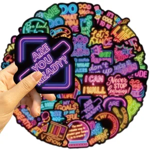 Detailed view of neon-style inspirational quote stickers featuring vibrant colors and slogans