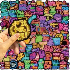 Detailed close-up showing motivational neon English stickers for laptop and DIY decoration