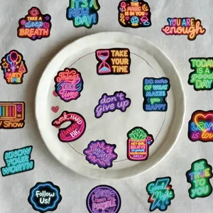 Detail of 100pcs neon-style motivational stickers for laptop and DIY decoration